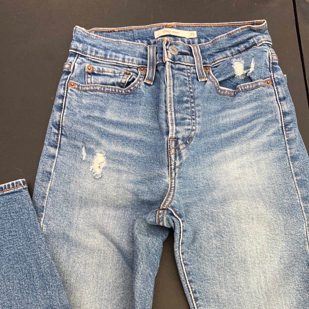 Distressed Levi Blue Denim Jeans
